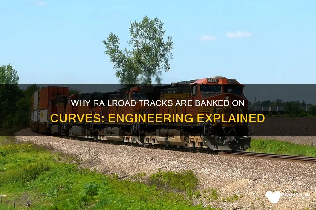 how are railroad tracks banked on turns