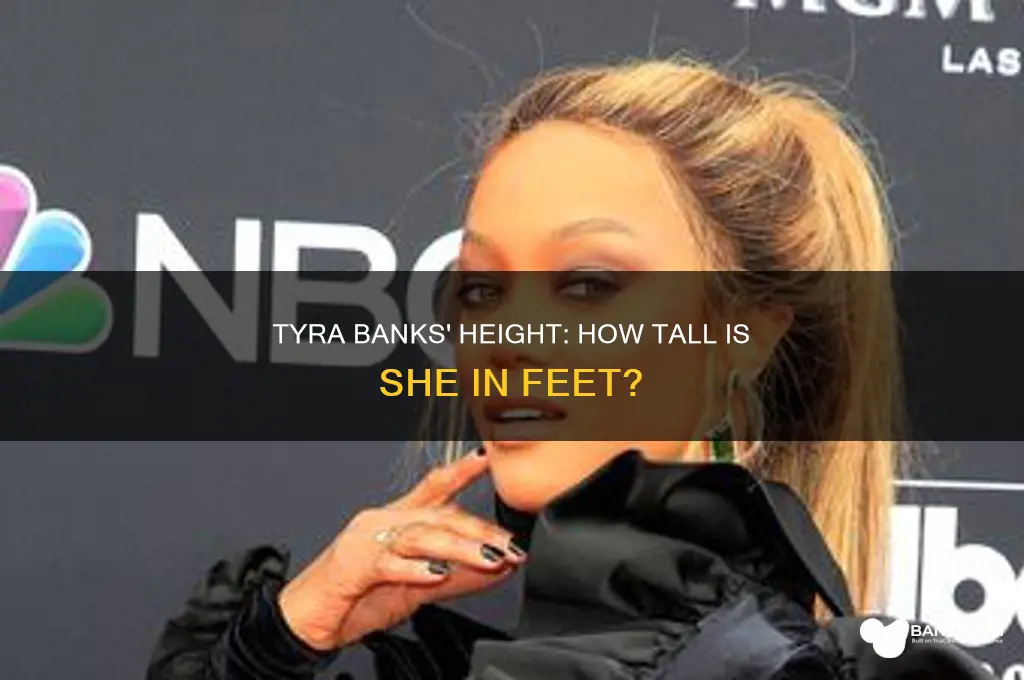 how tall is tyra banks in feet