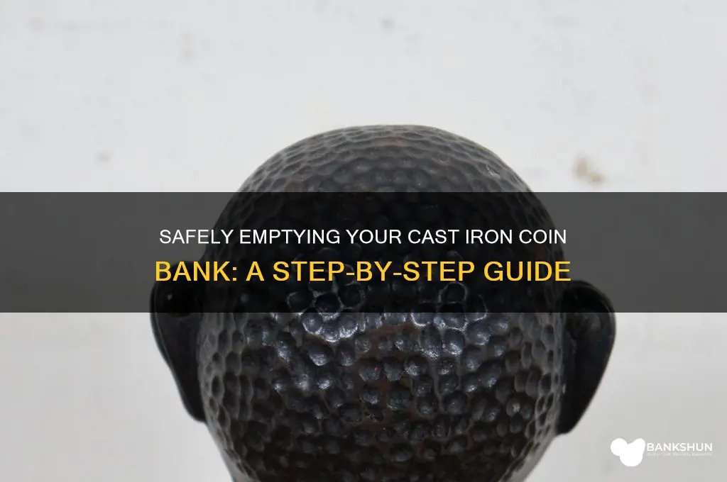 how to empty cast iron coin bank