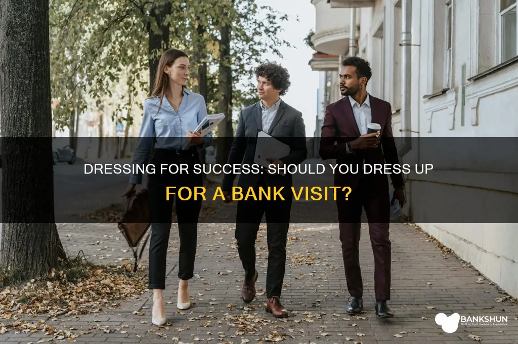 should i be dressedup for a bank