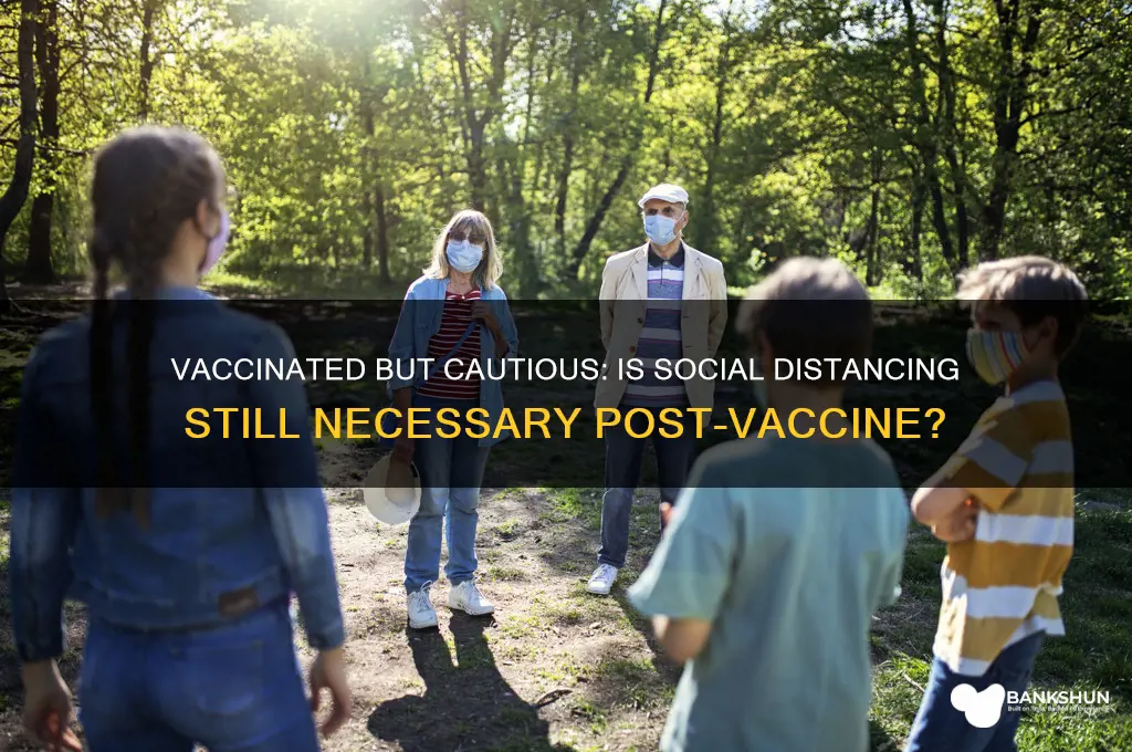 should i still social distance after vaccine