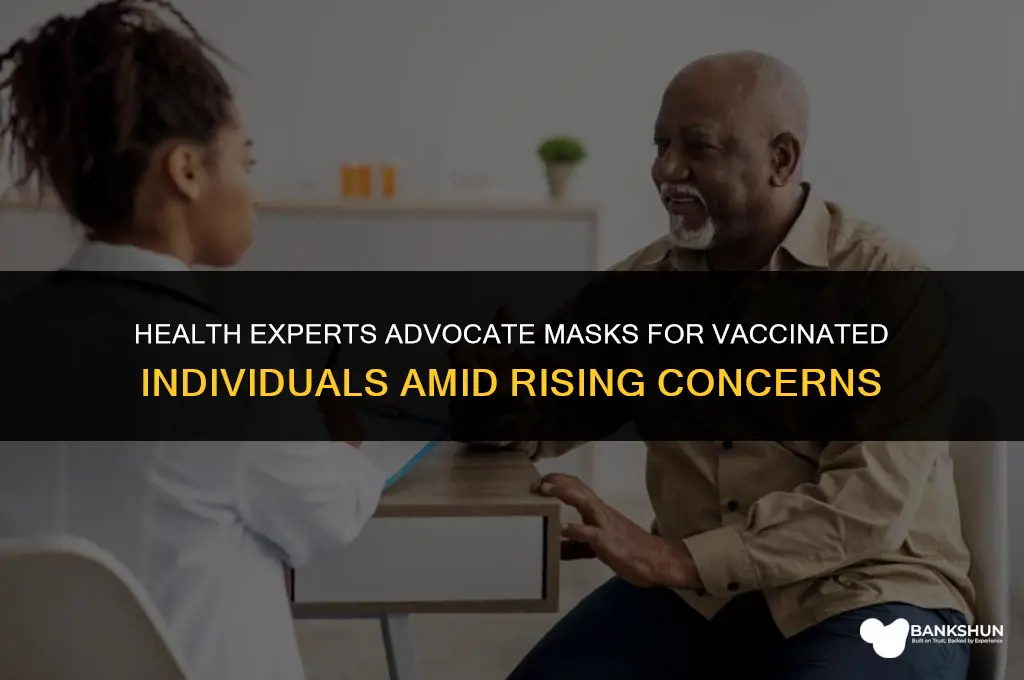 who recommends masks even for fully vaccinated